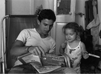 PHOTO: Photograph of father and child taken by Alan Pogue