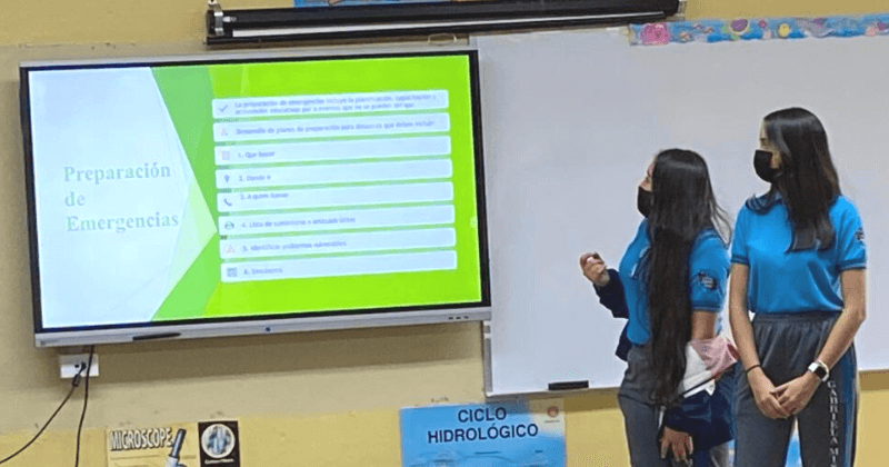 Participants presenting material to students